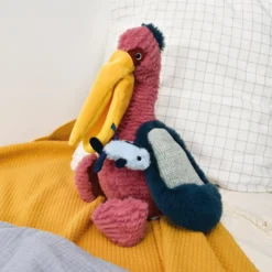 Peluche pelícano 34cm con texturas Histoire d´Ours