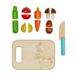 Set de verduras con tabla de cortar y cuchillo