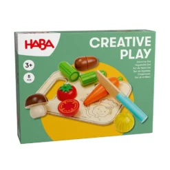 Set de verduras con tabla de cortar y cuchillo